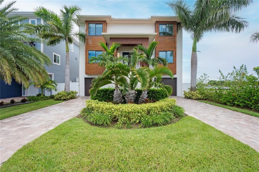 A showstopper from every angle! This breathtaking 4 bedroom/4 - Beach Home for sale in ST Pete Beach, Florida on Beachhouse.com