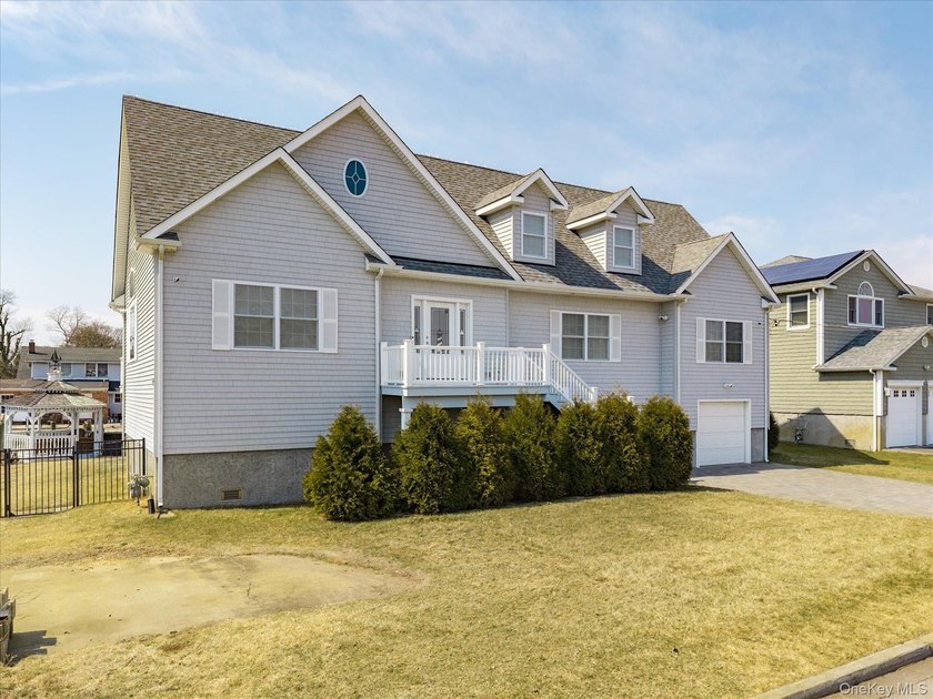 Elevated Waterfront Living with Endless Potential. Built in 2015 - Beach Home for sale in Massapequa, New York on Beachhouse.com