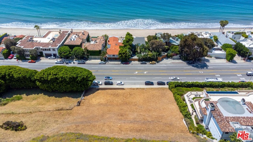 This is a rare opportunity to own a lot on PCH directly across - Beach Lot for sale in Malibu, California on Beachhouse.com