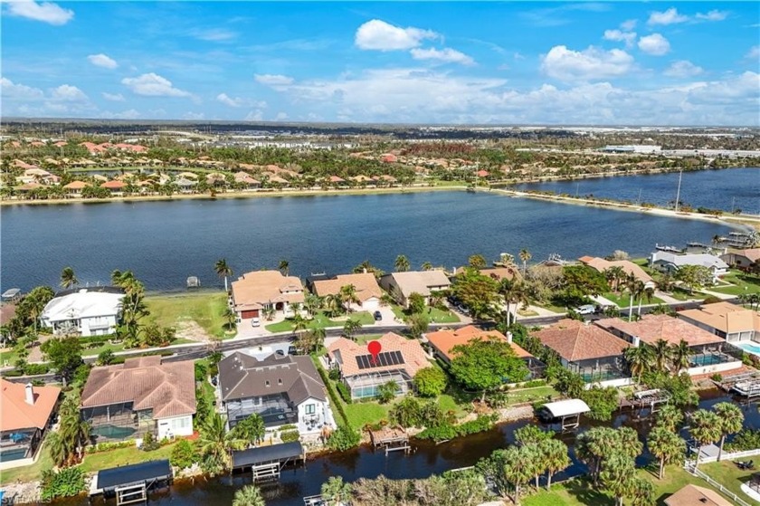 Gulf Access pool home with 4 Bedrooms, plus den and a spacious - Beach Home for sale in Fort Myers, Florida on Beachhouse.com