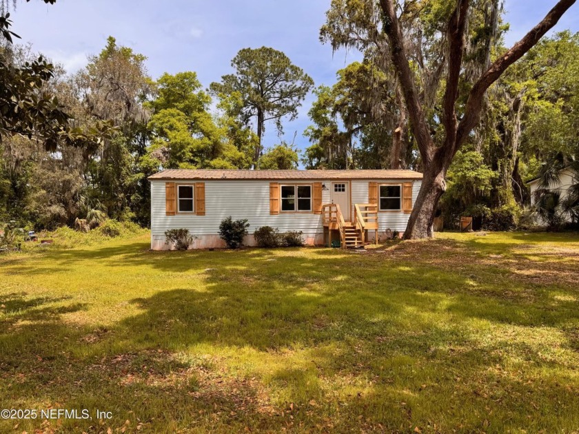 BRAND NEW EVERYTHING! This 3 bedroom 2 bath home sits on a shady - Beach Home for sale in Fernandina Beach, Florida on Beachhouse.com