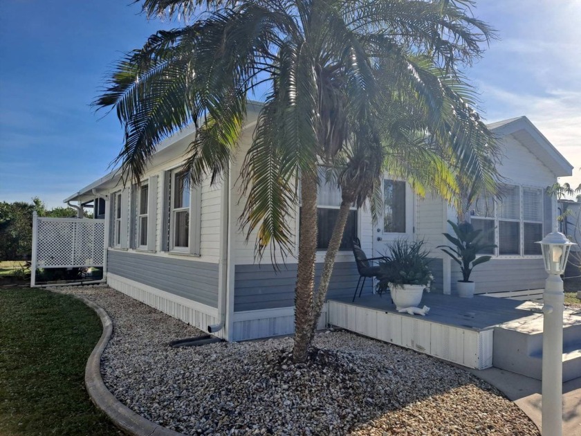 This Home Is Immaculate and Situated on The Lake with Awesome - Beach Home for sale in Port Charlotte, Florida on Beachhouse.com