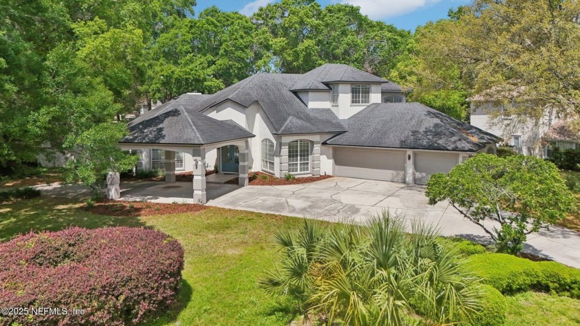Executive pool home nestled among beautiful oak trees in gated - Beach Home for sale in Green Cove Springs, Florida on Beachhouse.com