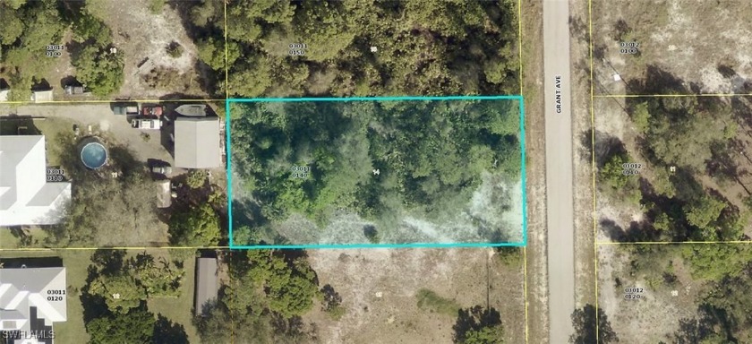 This Lot is in the Lake Camille Area and backs up to a beautiful - Beach Lot for sale in Lehigh Acres, Florida on Beachhouse.com