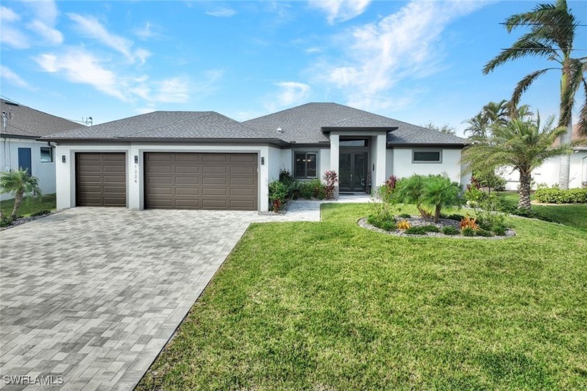 Presenting modern coastal luxury in NW Cape Coral! Built in 2023 - Beach Home for sale in Cape Coral, Florida on Beachhouse.com