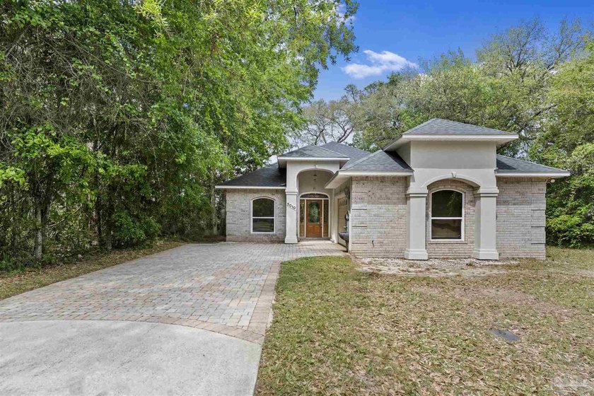 Waterfront living on Mulatto Bayou with direct access to - Beach Home for sale in Milton, Florida on Beachhouse.com