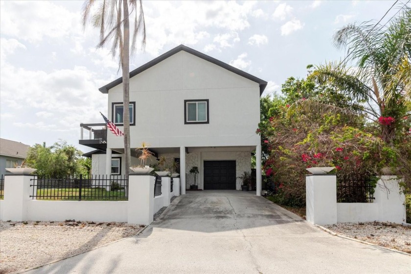 Welcome to this beautifully renovated waterfront home on the - Beach Home for sale in Tampa, Florida on Beachhouse.com