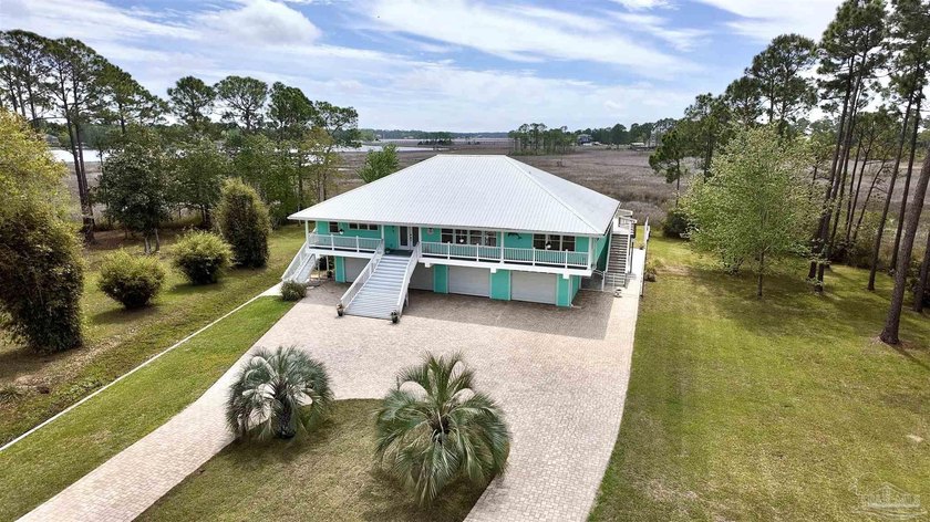 Now presenting a rare opportunity in the sought-after Mills - Beach Home for sale in Milton, Florida on Beachhouse.com