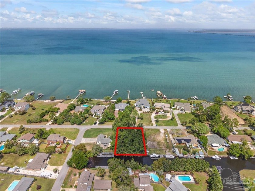 Create your ideal coastal retreat on this beautiful waterfront - Beach Lot for sale in Gulf Breeze, Florida on Beachhouse.com