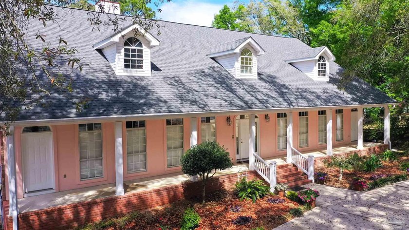 Experience the best of waterfront living in this beautifully - Beach Home for sale in Pensacola, Florida on Beachhouse.com