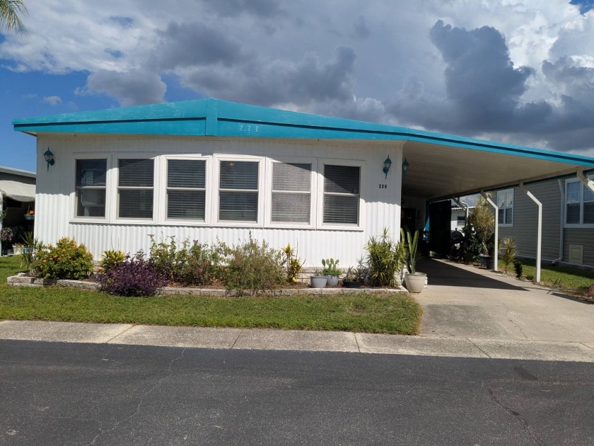 Welcome home to this real pretty 2 bedroom 2 bath double wide - Beach Home for sale in Clearwater, Florida on Beachhouse.com