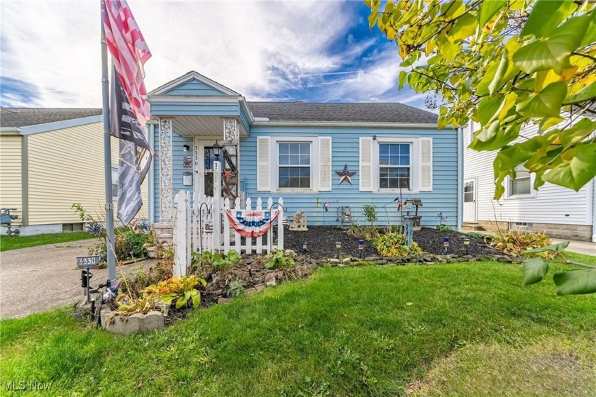 Charming Home with Private Backyard Oasis! This delightful - Beach Home for sale in Lorain, Ohio on Beachhouse.com