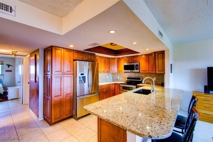 Top-floor PENTHOUSE unit with elevator access, offering ultimate - Beach Condo for sale in Cape Coral, Florida on Beachhouse.com