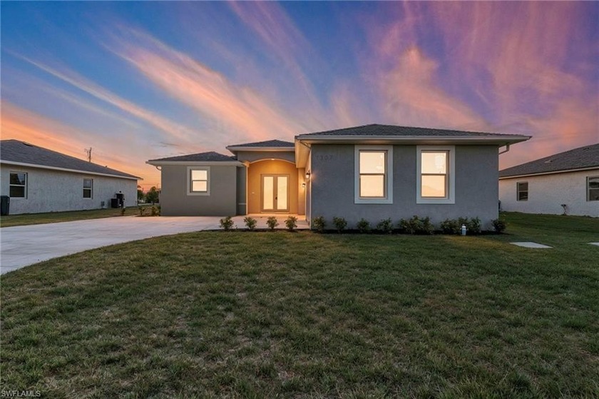 Step into modern Florida living with this brand-new Cape Coral - Beach Home for sale in Cape Coral, Florida on Beachhouse.com