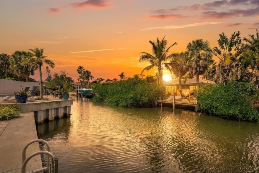Positioned along a quiet residential canal just moments from - Beach Home for sale in Sarasota, Florida on Beachhouse.com