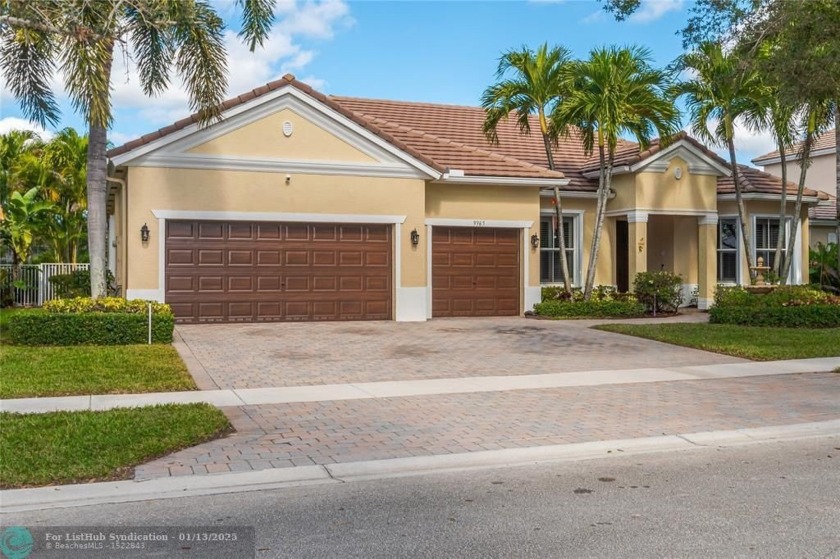 GORGEOUS! Low HOA! 4 beds, 2.5 bath water view home with 3 car - Beach Home for sale in Lake Worth, Florida on Beachhouse.com