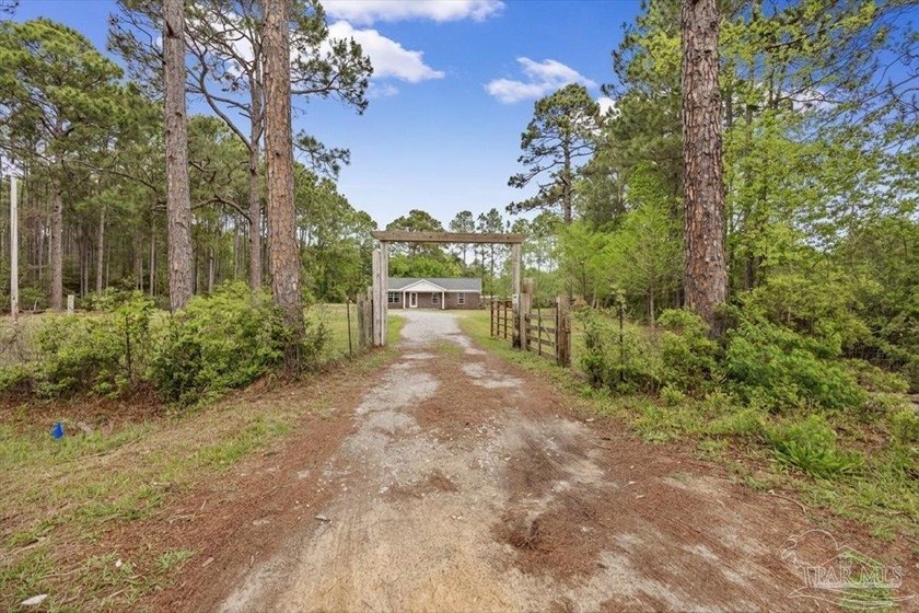 Escape to Your Quiet Country Acre - Minutes to the Beach & No - Beach Home for sale in Milton, Florida on Beachhouse.com