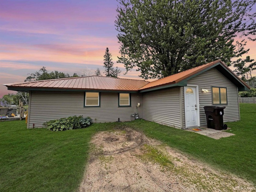 Lakefront living! This 3 bedroom, 2 bathroom home boasts - Beach Home for sale in Escanaba, Michigan on Beachhouse.com