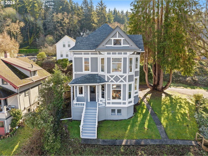 Discover the charm of Astoria in this 4-bed, 2.5-bath Victorian - Beach Home for sale in Astoria, Oregon on Beachhouse.com