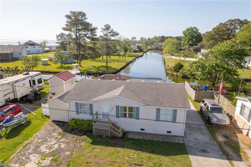 Charming canal-front home with so much potential is ready for - Beach Home for sale in Grandy, North Carolina on Beachhouse.com