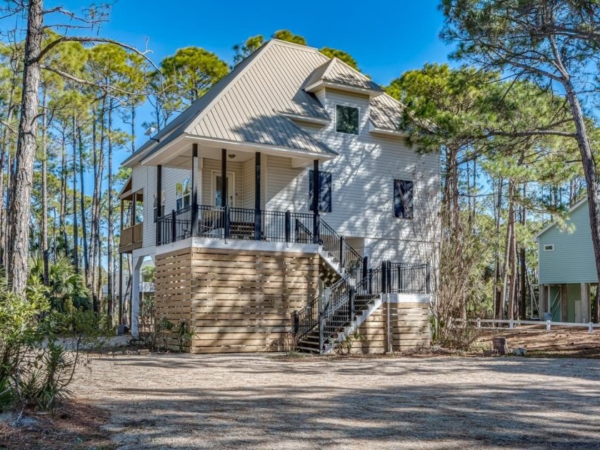 Discover your perfect coastal retreat with this beautiful - Beach Home for sale in Alligator Point, Florida on Beachhouse.com