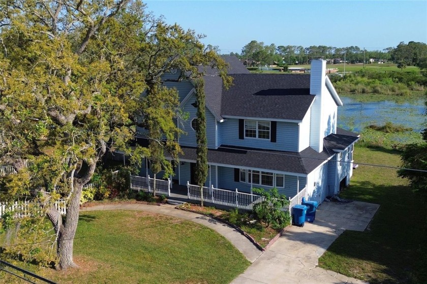 Across the street from a golf course, just off Hunter's Lake - Beach Home for sale in Spring Hill, Florida on Beachhouse.com