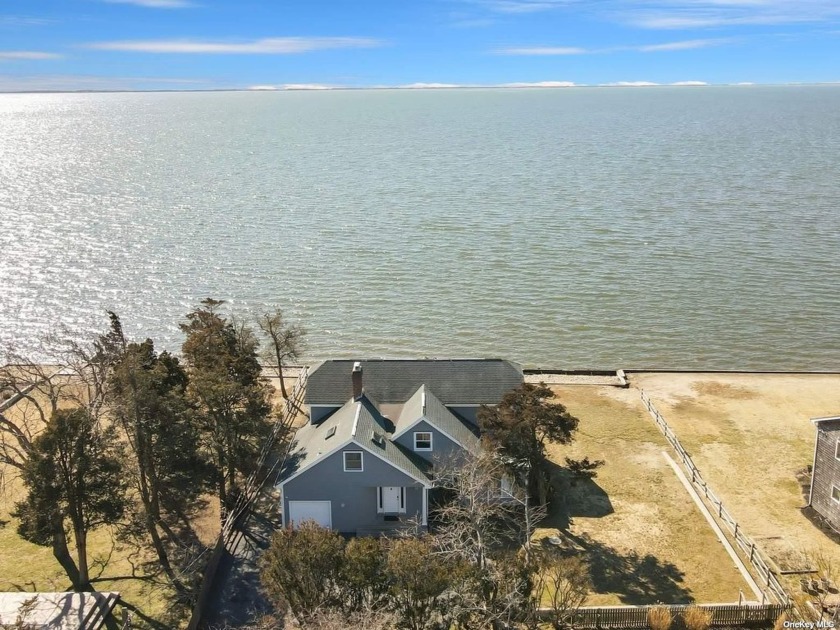 A slice of waterfront paradise!  Located within the Bellport - Beach Home for sale in East Patchogue, New York on Beachhouse.com