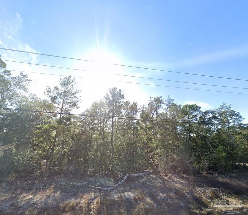 This corner lot on East Bay Blvd in Navarre, offers an - Beach Lot for sale in Navarre, Florida on Beachhouse.com