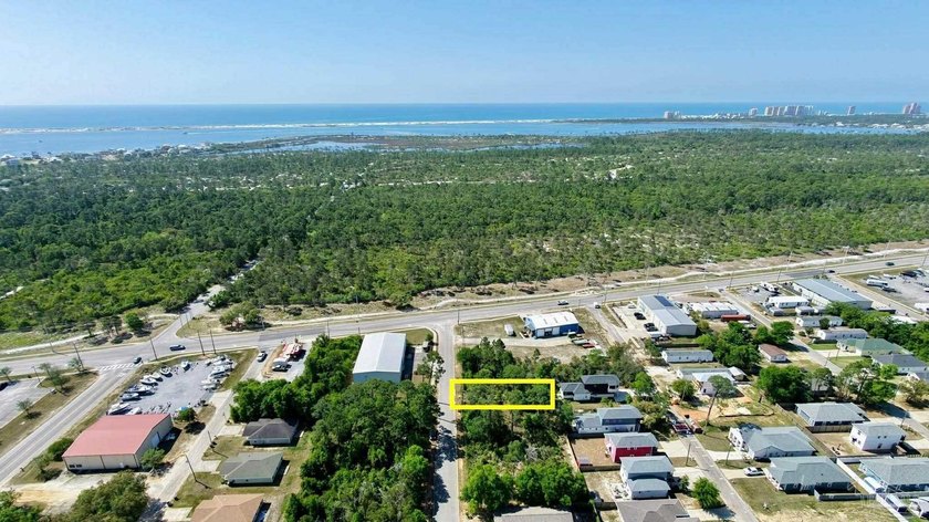 Build your vision from the ground up on this partially cleared - Beach Lot for sale in Pensacola, Florida on Beachhouse.com