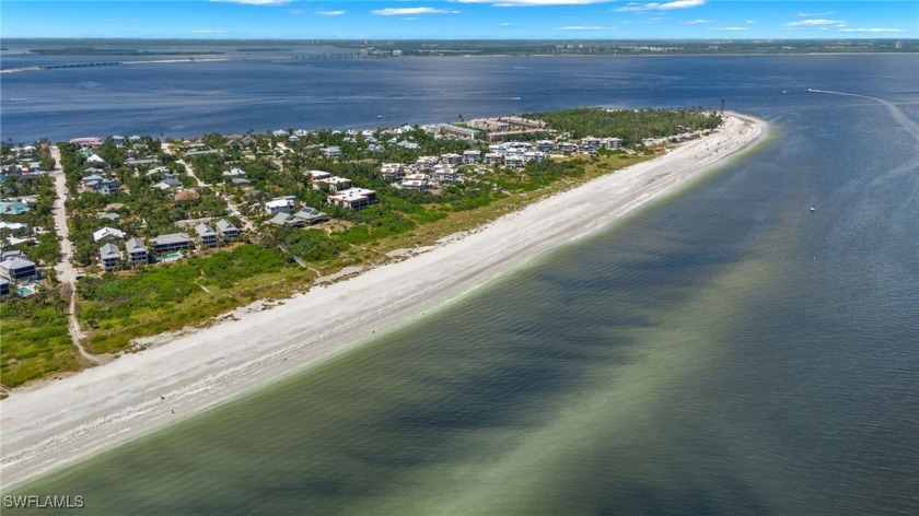 This East End duplex, just steps from the beach down a charming - Beach Townhome/Townhouse for sale in Sanibel, Florida on Beachhouse.com