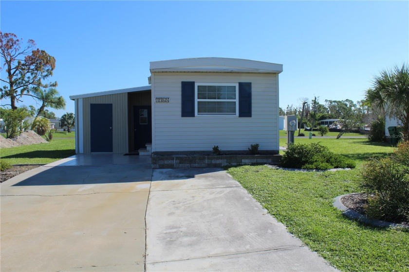 TROPICAL LIVING AWAITS!  This 1 bedroom, 1 -1/2 bath home is - Beach Home for sale in Port Charlotte, Florida on Beachhouse.com