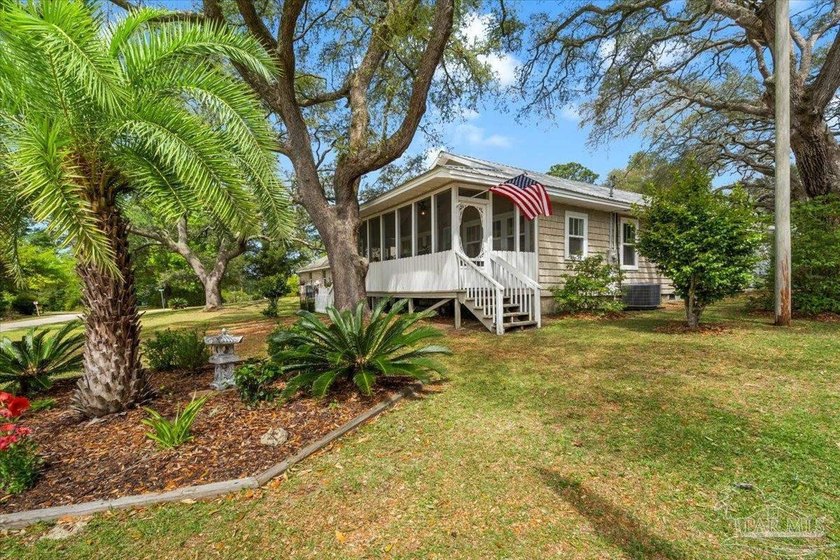 One of a kind, coastal cottage overflowing with charm in the - Beach Home for sale in Elberta, Alabama on Beachhouse.com