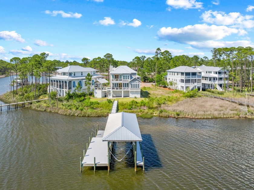 Nestled in the heart of Santa Rosa Beach, this bayfront custom - Beach Home for sale in Santa Rosa Beach, Florida on Beachhouse.com