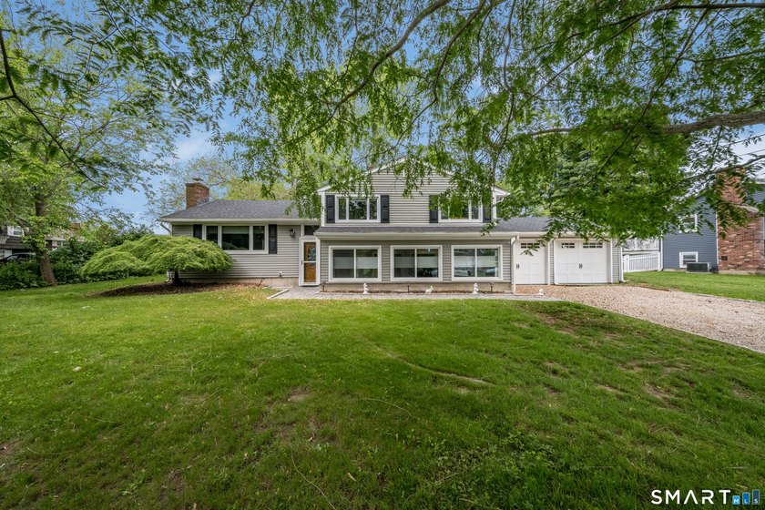 Coastal living meets worry-free luxury in this completely - Beach Home for sale in Clinton, Connecticut on Beachhouse.com