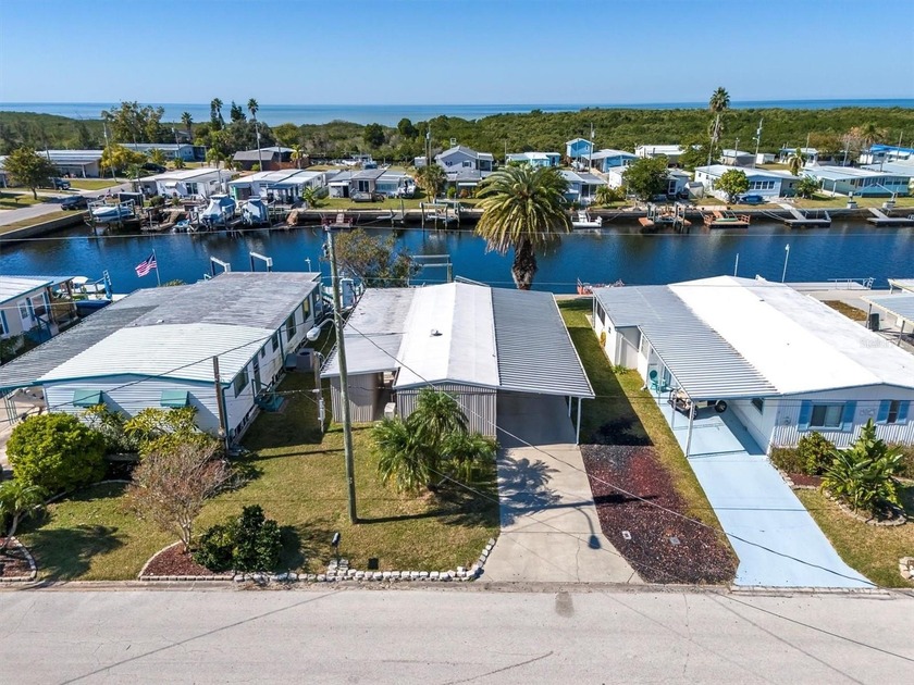 MOVE IN READY! Located on one of the most widest and deepest - Beach Home for sale in Hudson, Florida on Beachhouse.com