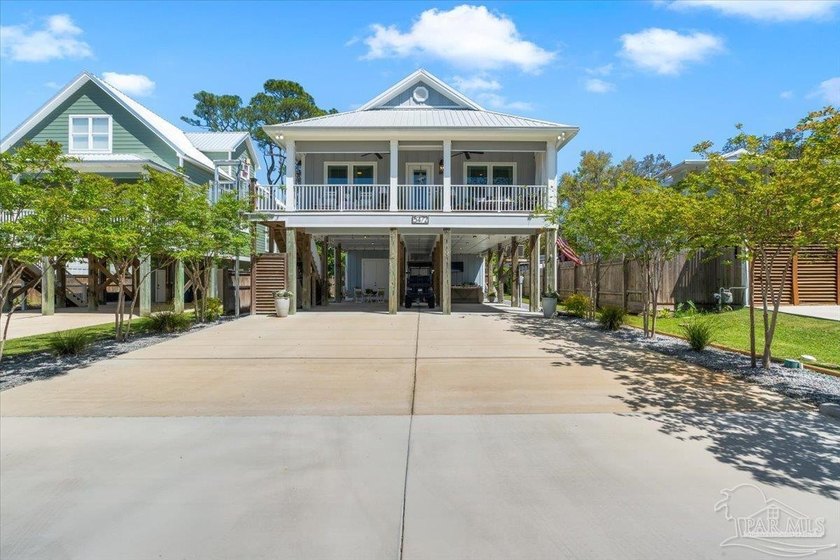 EMACULATE AND BEAUTIFULLY DECORATED, this GOLD FORTIFIED home is - Beach Home for sale in Orange Beach, Alabama on Beachhouse.com