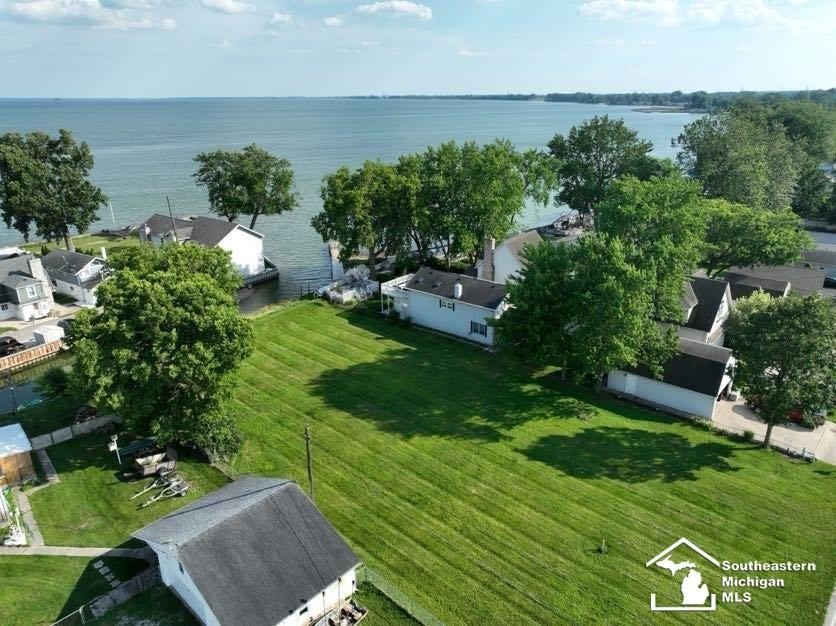 Discover the perfect spot for your dream home on this exquisite - Beach Lot for sale in Luna Pier, Michigan on Beachhouse.com