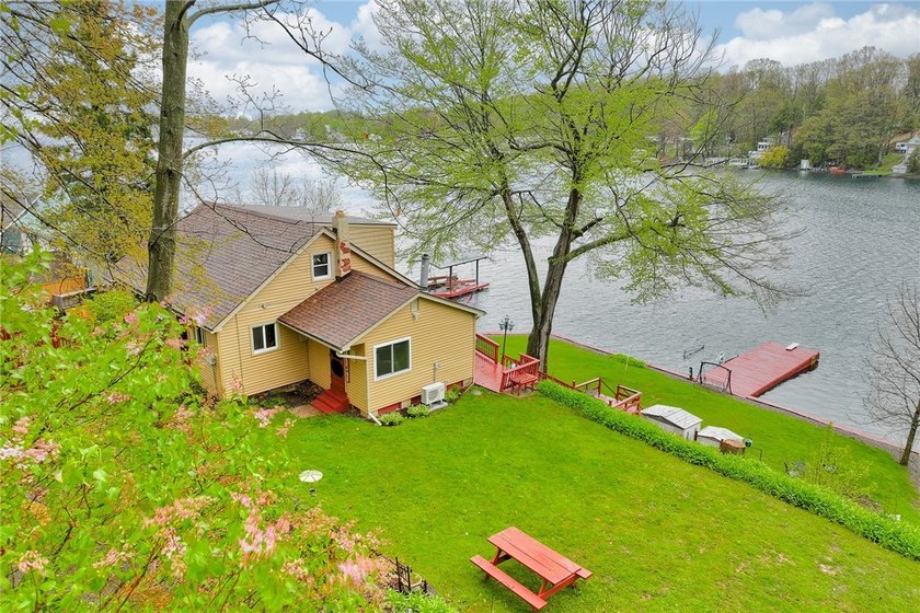 Tucked into the hillside, this awesome lakefront home offers so - Beach Home for sale in Wolcott, New York on Beachhouse.com