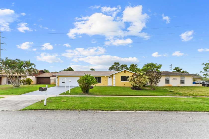 Welcome to this charming 1-story home located in the desirable - Beach Home for sale in Riviera Beach, Florida on Beachhouse.com