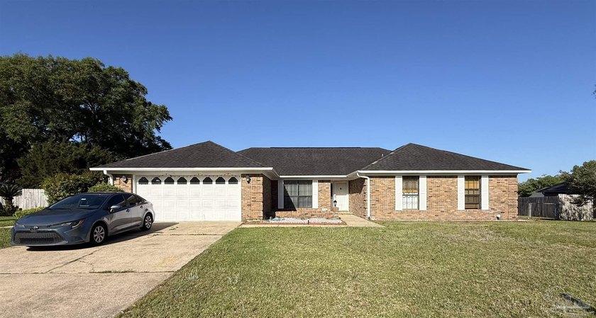 This charming 4-bedroom, 2.5-bath home is located in the - Beach Home for sale in Pensacola, Florida on Beachhouse.com