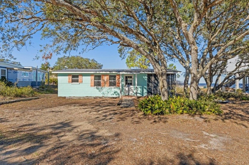 Find your way home to *The Beach Nest*, a low maintenance easy - Beach Home for sale in Bald Point, Florida on Beachhouse.com