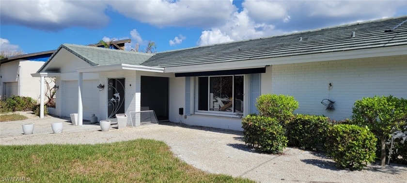 Shell Harbor for under $800K !!! Ground level canal home with - Beach Home for sale in Sanibel, Florida on Beachhouse.com