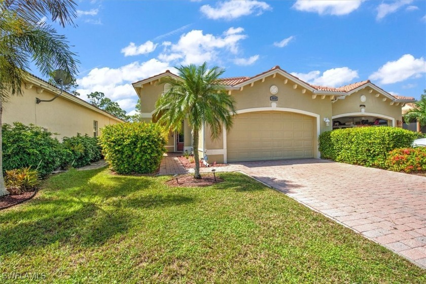 Darling Villa with screened lanai overlooking the 12th green of - Beach Home for sale in Lehigh Acres, Florida on Beachhouse.com