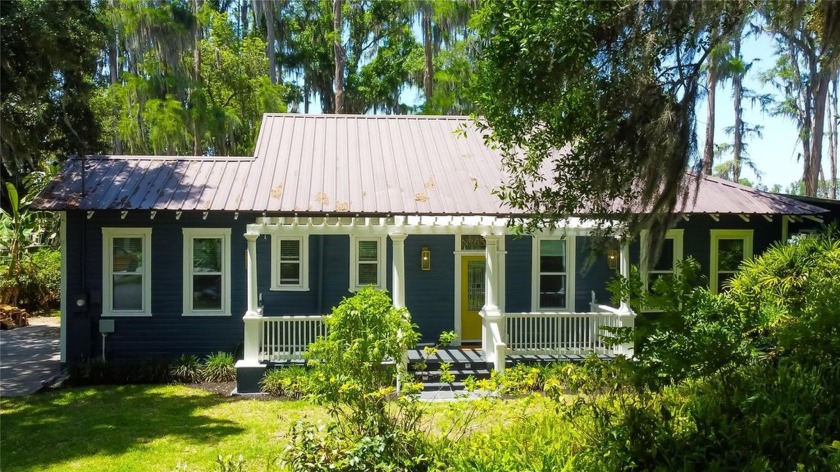 Charming Lakeside Bungalow on Over an Acre - A Designer's 
 - Beach Home for sale in Land O Lakes, Florida on Beachhouse.com