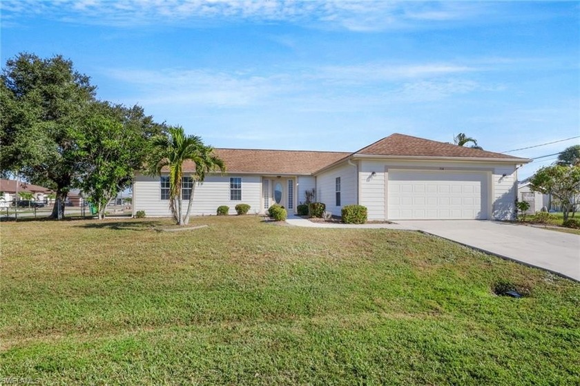 This well-maintained 3-bedroom, 2-bathroom home is situated on a - Beach Home for sale in Port Charlotte, Florida on Beachhouse.com