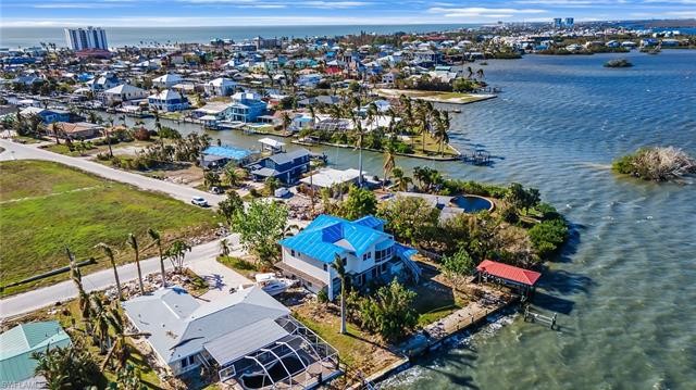 Unique and rare BAY FRONT property is now on the market! BIG - Beach Home for sale in Fort Myers Beach, Florida on Beachhouse.com