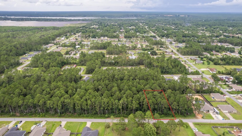 Come build your dream home on this large .45 acre lot in Navarre - Beach Lot for sale in Navarre, Florida on Beachhouse.com