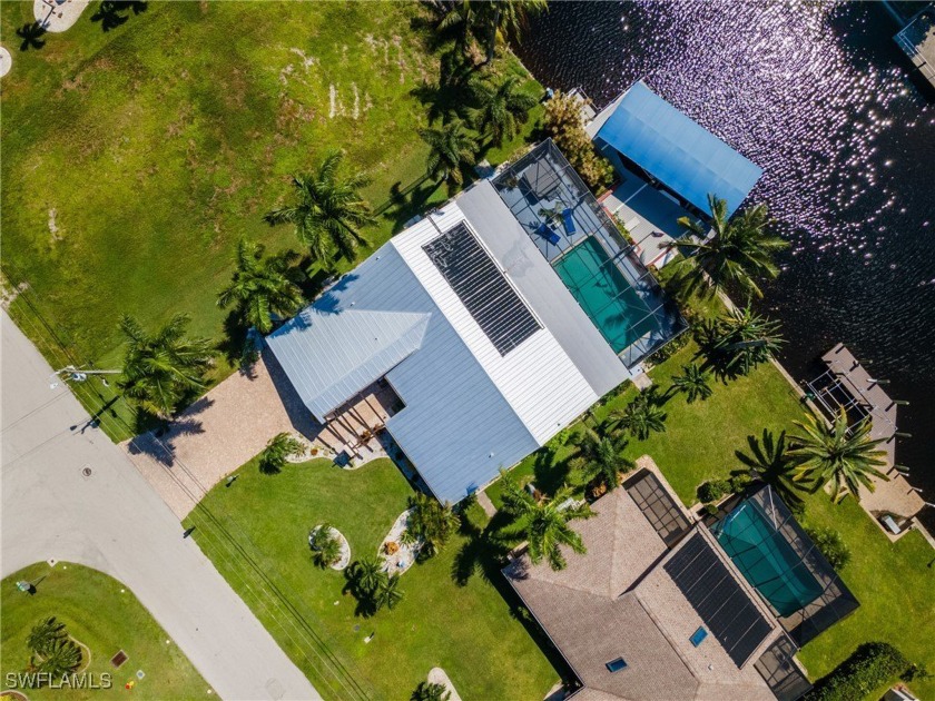 Discover this beautifully maintained 3-bedroom, 2-bathroom pool - Beach Home for sale in Cape Coral, Florida on Beachhouse.com