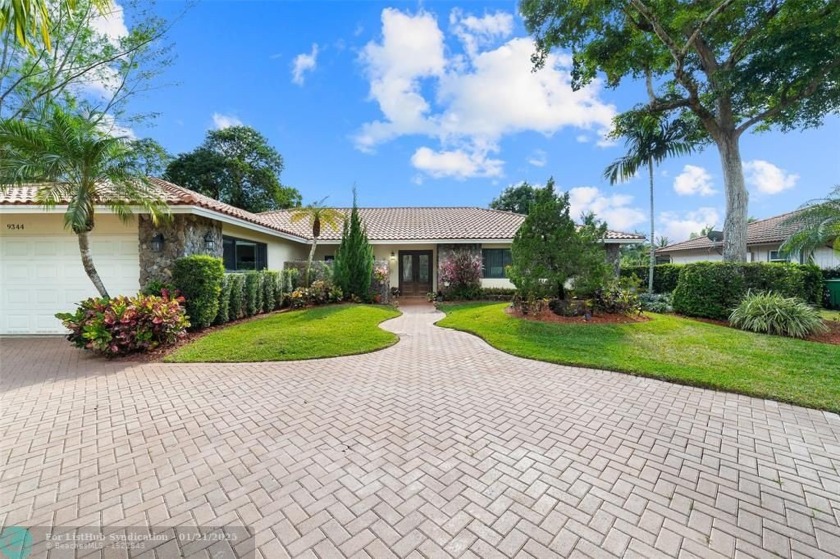 Spacious Waterfront Pool Home - Midcentury Modern Design.  This - Beach Home for sale in Coral Springs, Florida on Beachhouse.com