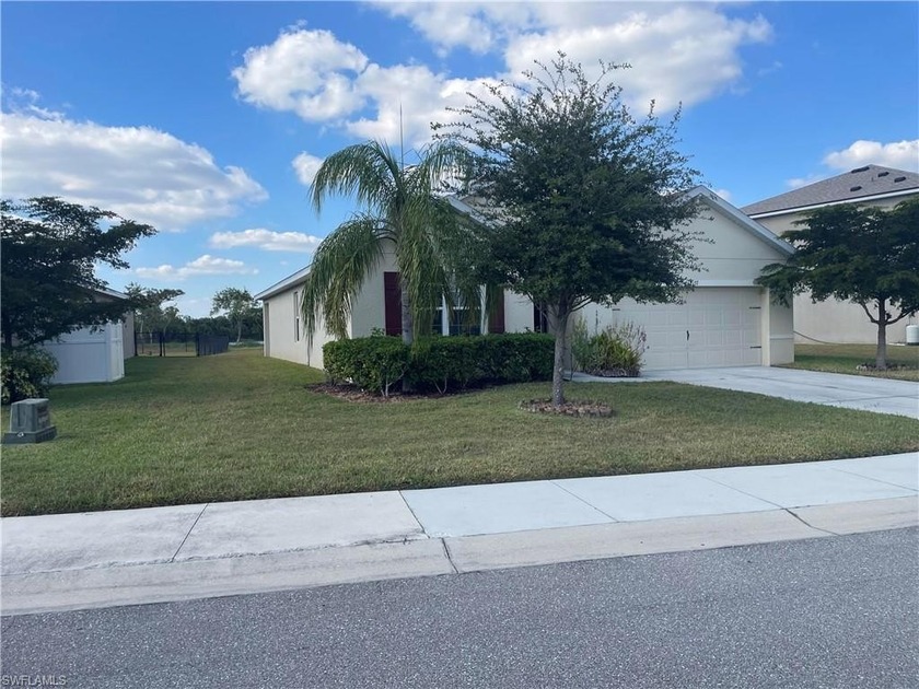 This 4 bedroom 2 bath home was freshly painted inside including - Beach Home for sale in Lehigh Acres, Florida on Beachhouse.com